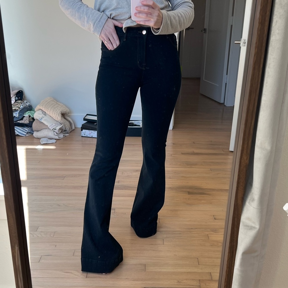 Never worn J BRAND The Doll High Waist bell bottom jean, size 26. Color: Aura